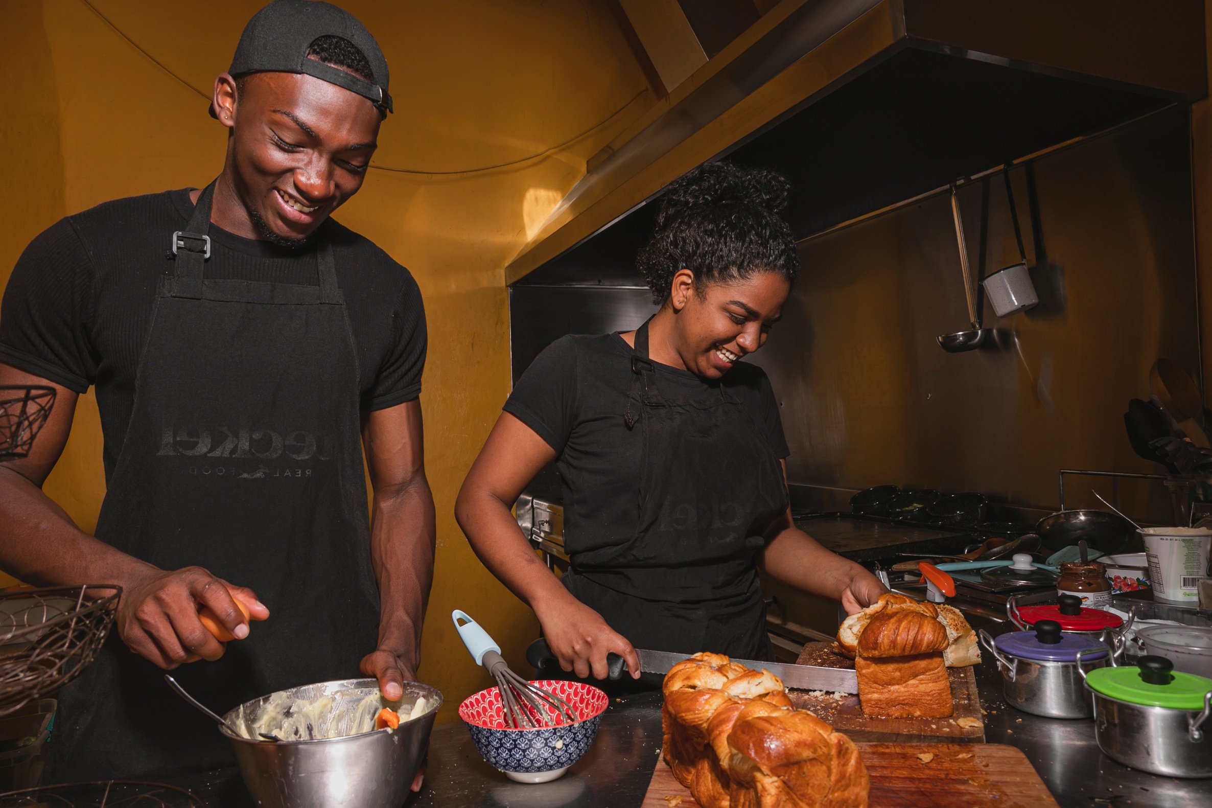 Two Happy Chefs Cooking in the Kitchen